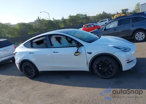 2022 Tesla Model Y из США, поврежденный, VIN 7SAYGDEE8NF491892